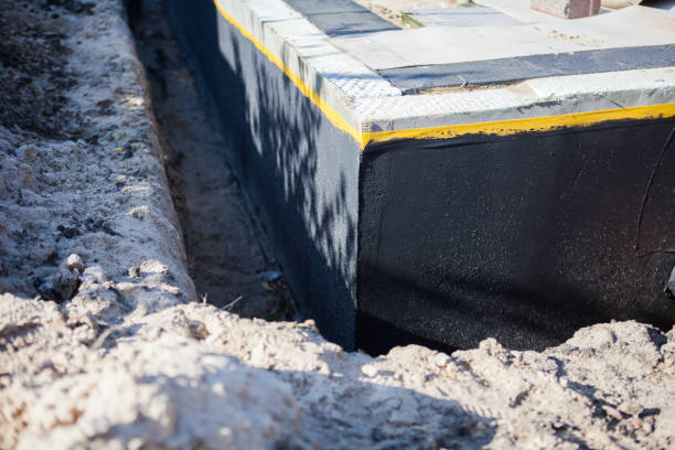 Professional Waterproofing technician working in Manasquan, NJ